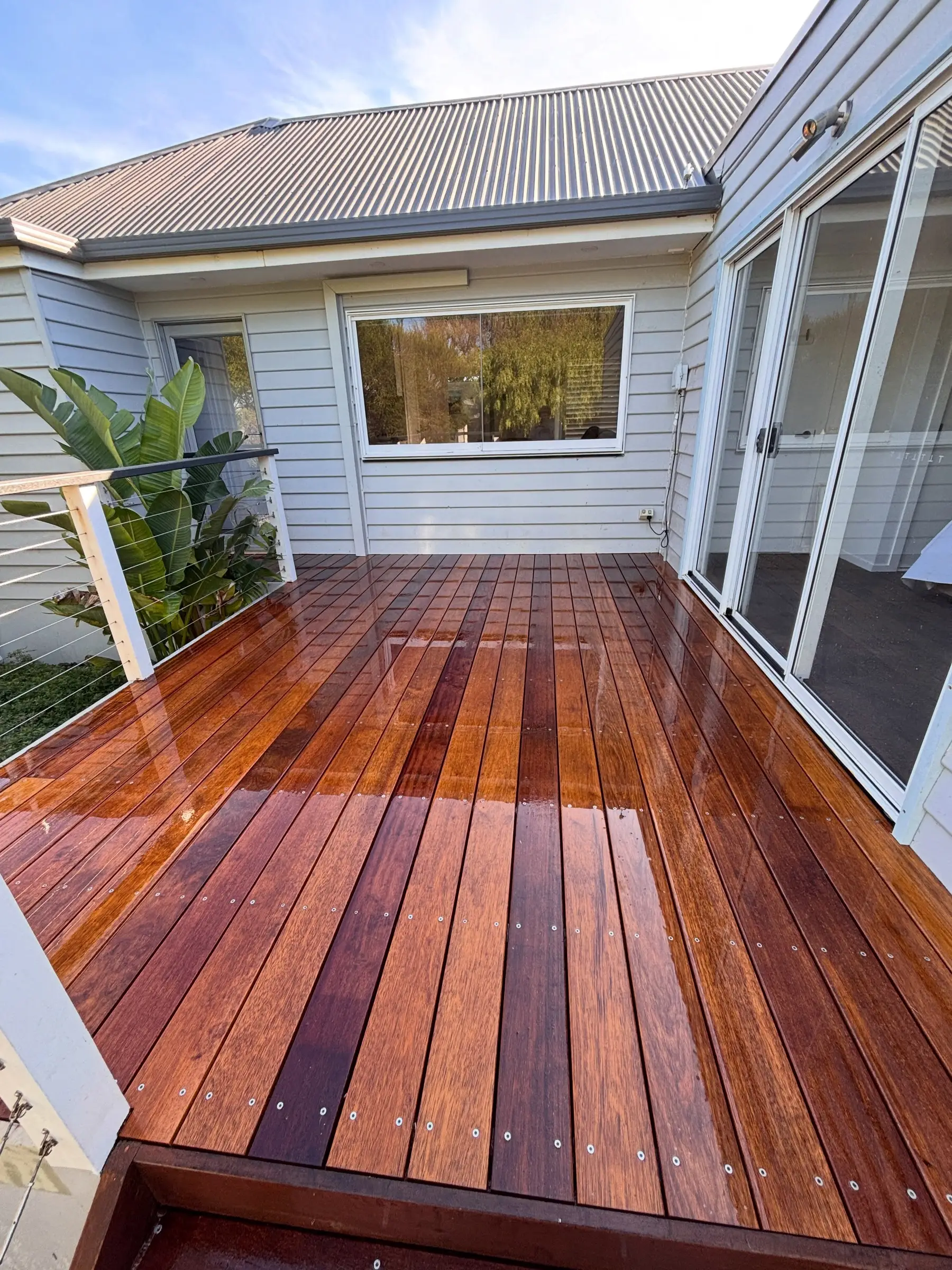 Home exterior with a timber deck