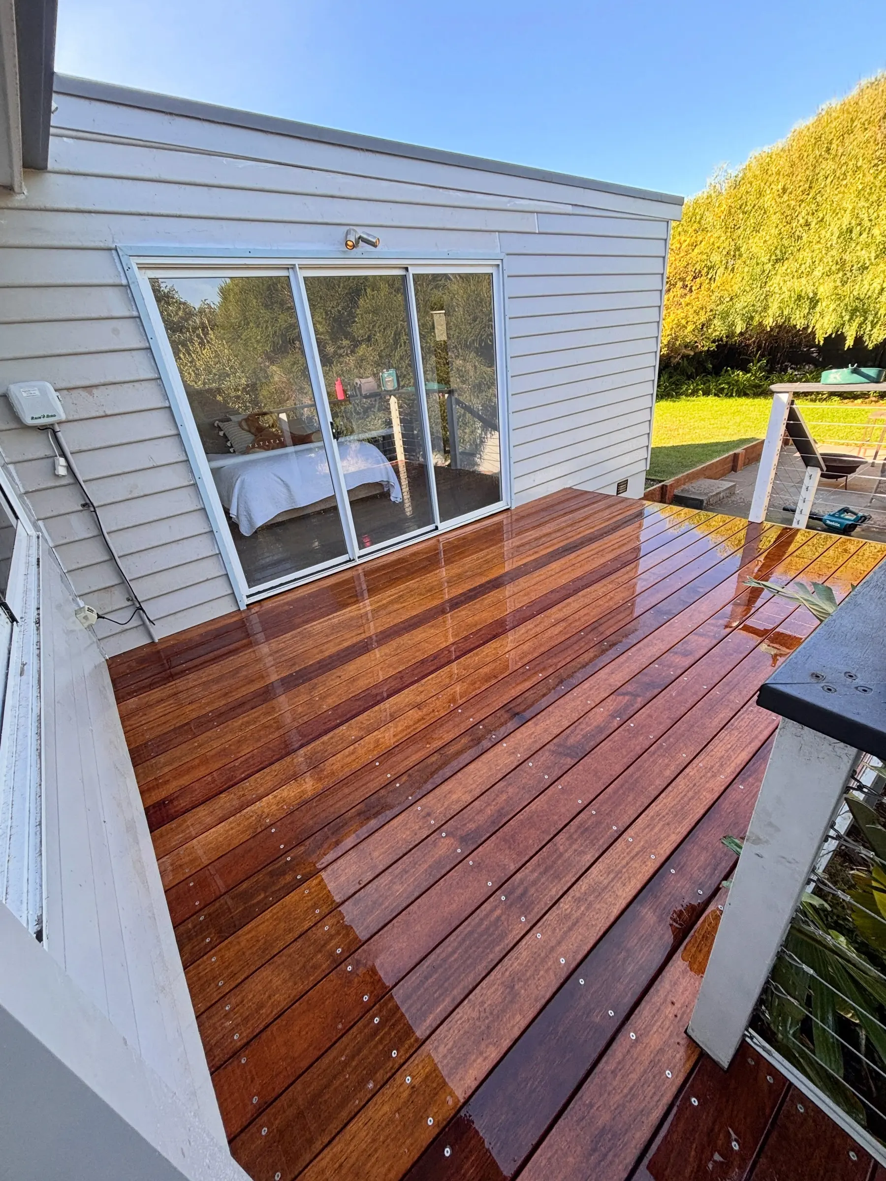 New timber deck with sliding doors